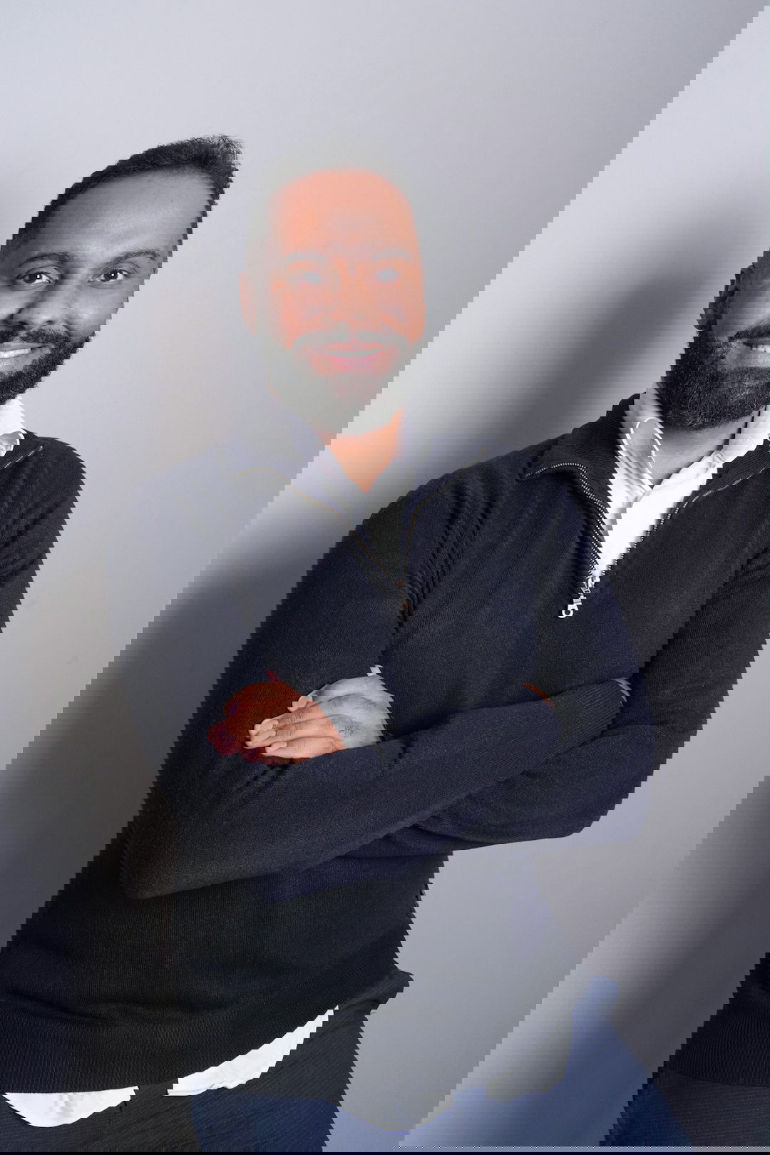 man in black zip up jacket